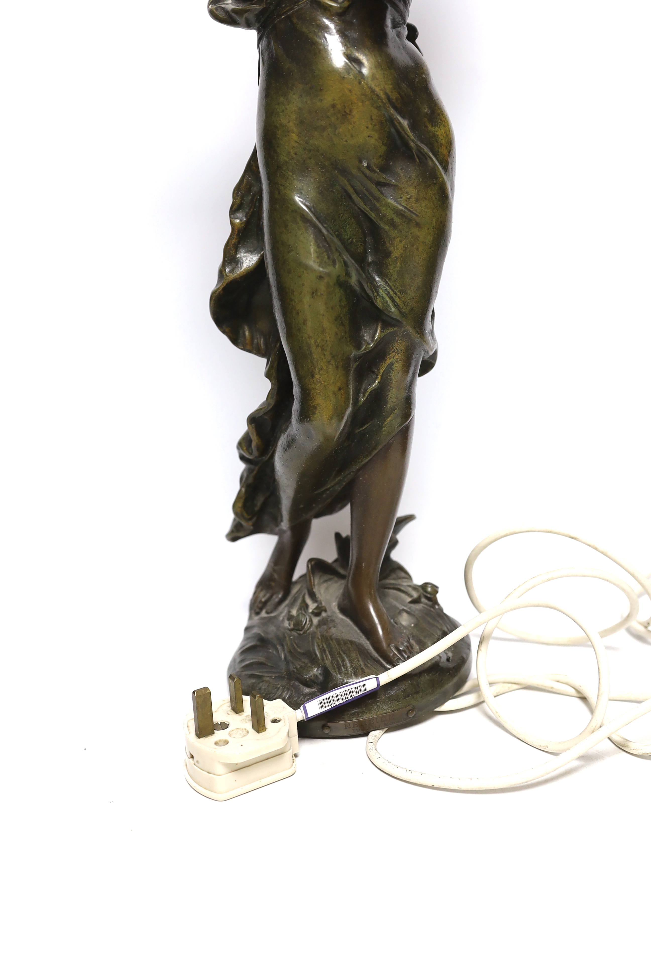 After Auguste Moreau (1834-1917) an Art Nouveau style spelter figural table lamp, applied plaque, 53cm high